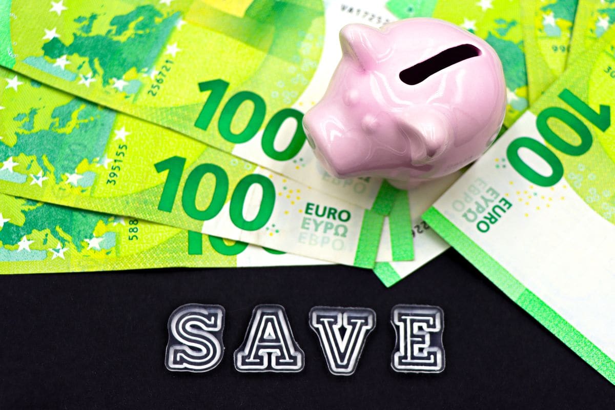 Piggy bank with cash, a savings concept
